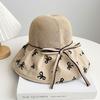 Hat women's spring and summer new bow knitted empty top hat vinyl sunscreen beach sunshade printing folding sun hat
