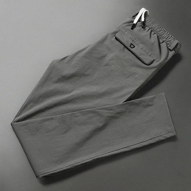 

Новые летние тонкие ледяные быстросохнущие прямые брюки свободного кроя в стиле кэжуал с высокой посадкой, на шнуровке, с карманом, мужские спортивные брюки 33 серый