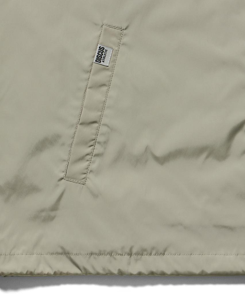 Discus Athletic Letter Logo Coach Jacket Sand Beige