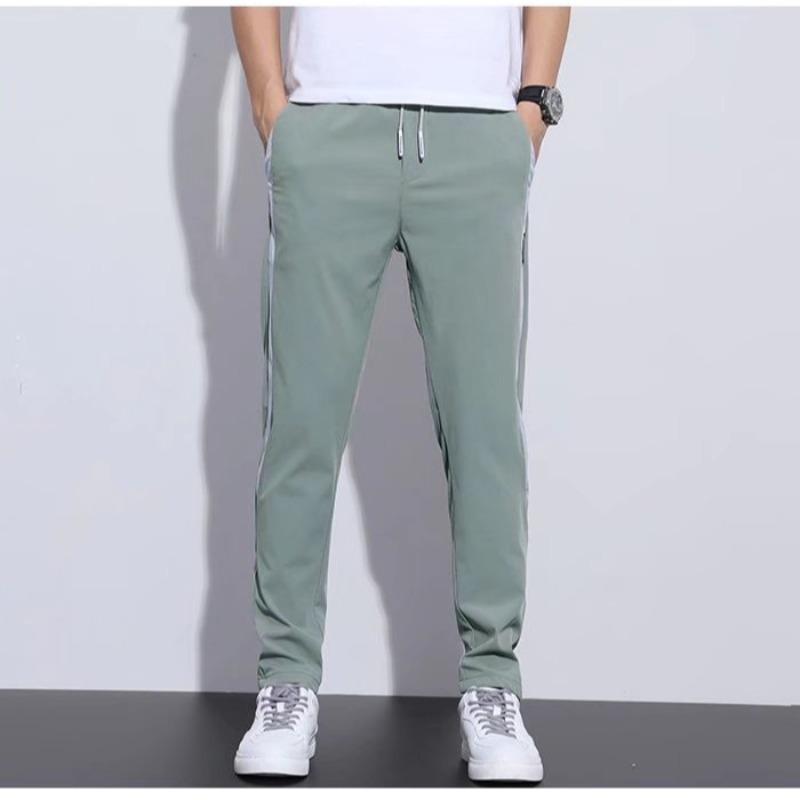 

Casual Trousers Men s Summer New Four-sided Elastic Thin Ice Silk Straight Pants Light Business Splicing Slim Pants 5XL