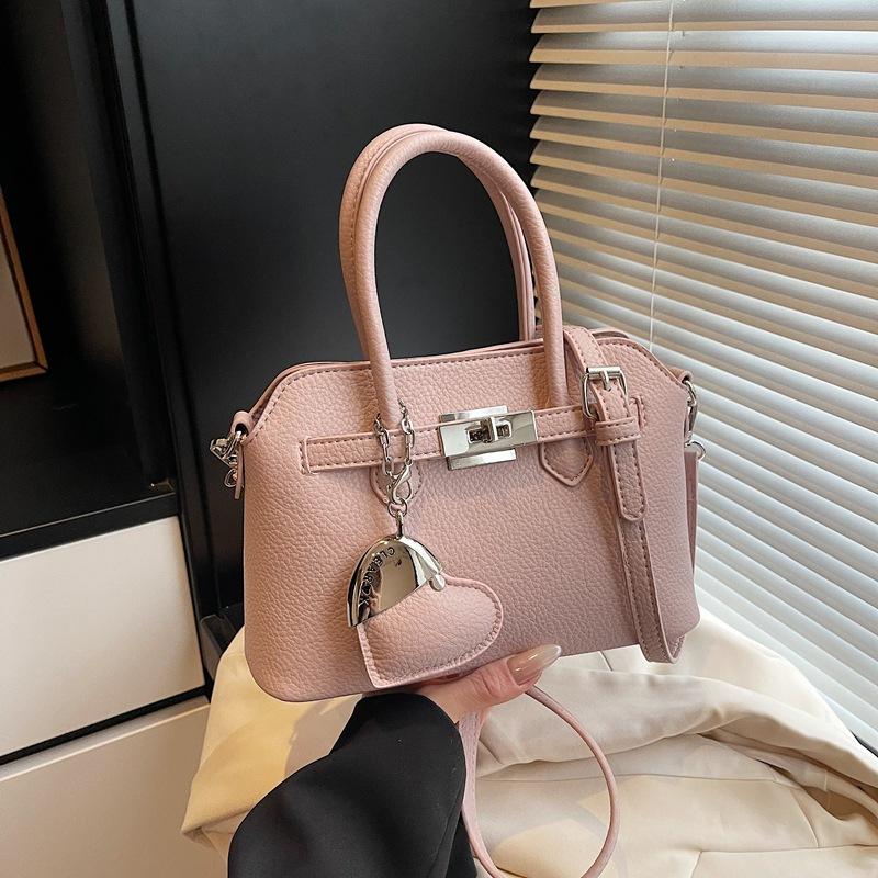 Simple temperament hand bag women's spring new niche fashion messenger bag commuter shoulder bag