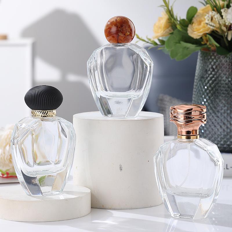 Elegant Transparent Glass Perfume Bottle with Round-Edge Polygon Design and Thick Base