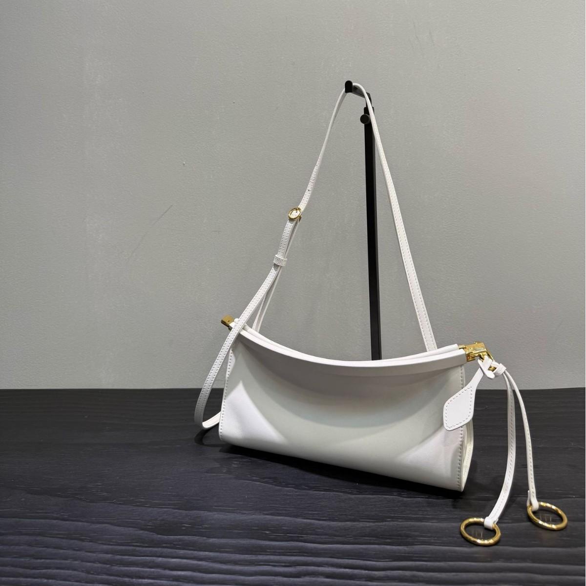 

Нишевый дизайн во французском стиле Чрезвычайно простая сумка из коровьей кожи через плечо и подмышку Повседневная простая и модная Универсальная женская сумка-багет 30x7x16cm белый