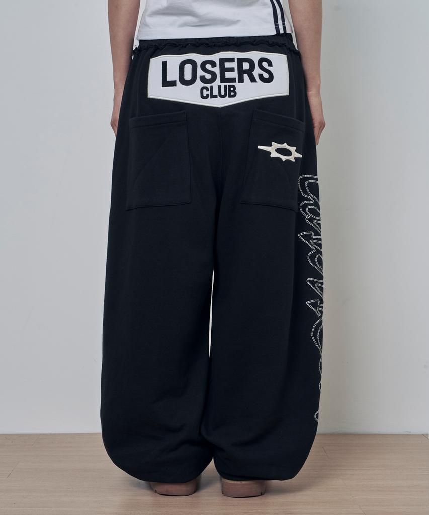 Lujeoseukeulleob Script Logo Wide Sweatpants Black