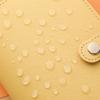 A large capacity cash wallet for managing finances, used for storing cash and banknotes