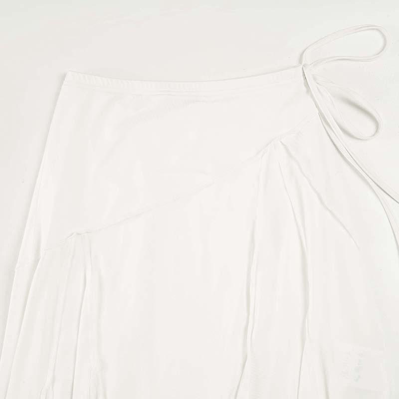 Elegant French White Irregular Half Skirt with Flowing Drape, Side Tie, and Low Waist Design