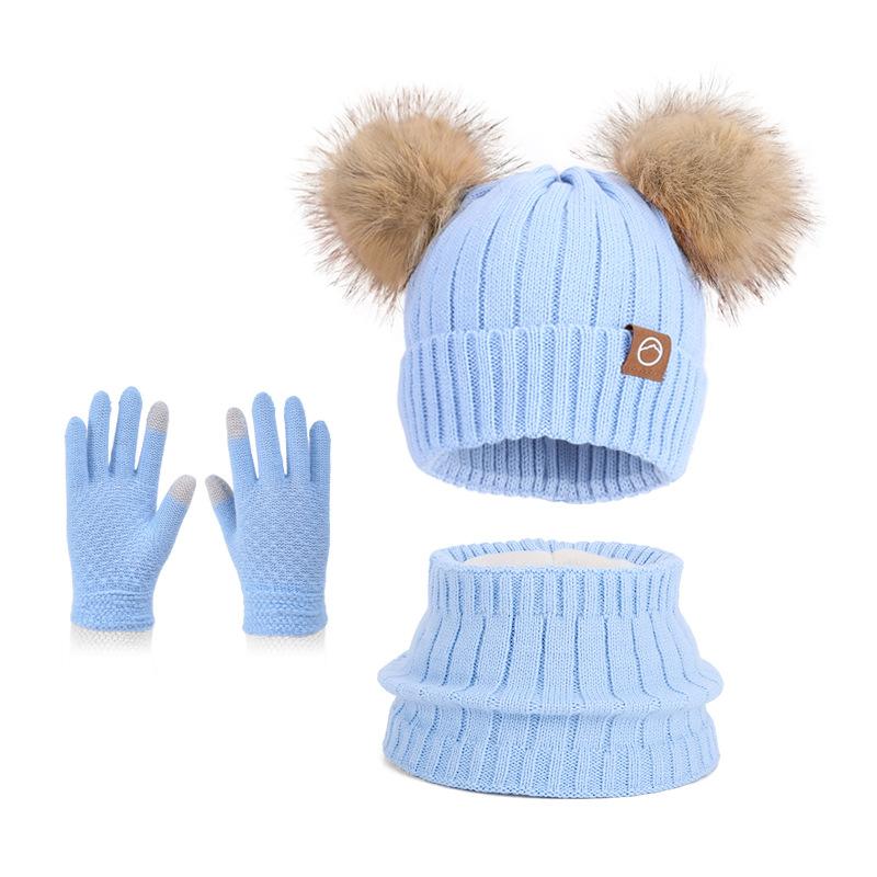 Children's hats Outdoor warm three-piece set Boys and girls fleece ear protector pullover hat Cute hairball knitted wool hat