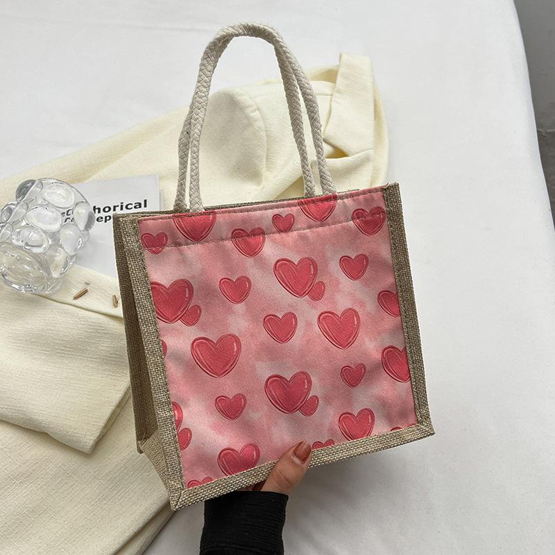 

Spot wholesale bento lunch box bag female 2025 summer out hand bag Japanese girl hand carry linen bag