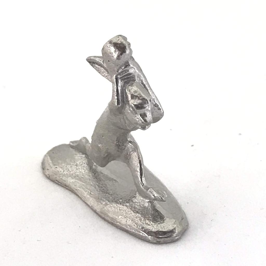 A miniature tin rabbit from the Choju Jinbutsu Giga perfect for your dry landscape painting, garden.