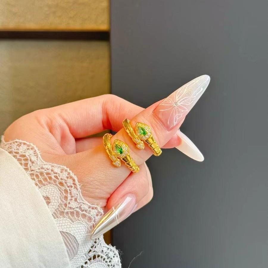 Adjustable Unique Copper Gold Plated Snake Ring For Women Featuring Elegant Red And Green Accents Gemstone
