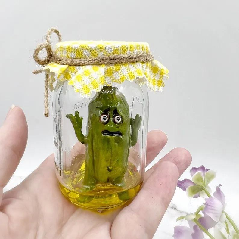 1Pcs Grumpy Pickle in A Jar Sculpture Creative Mini Grumpy Clear Glass Pickle Statue Funny Aojiao Jar Pickle Cartoon Display 9CMX6CMX6CM