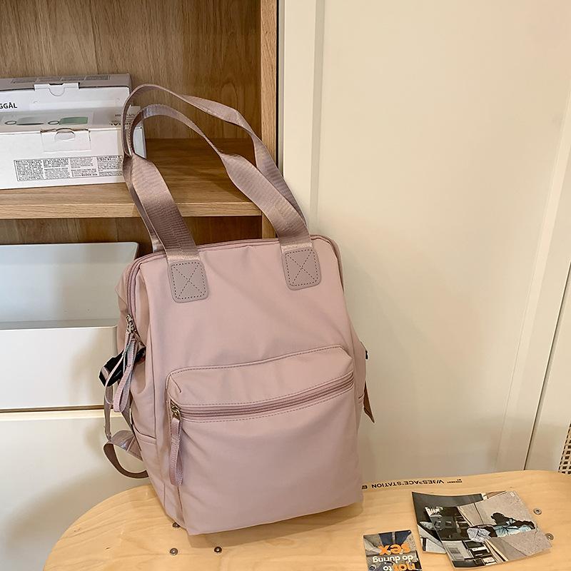 Large capacity multi-functional backpack, new Japanese fashion backpack, female college student shoulder bag, lightweight schoolbag
