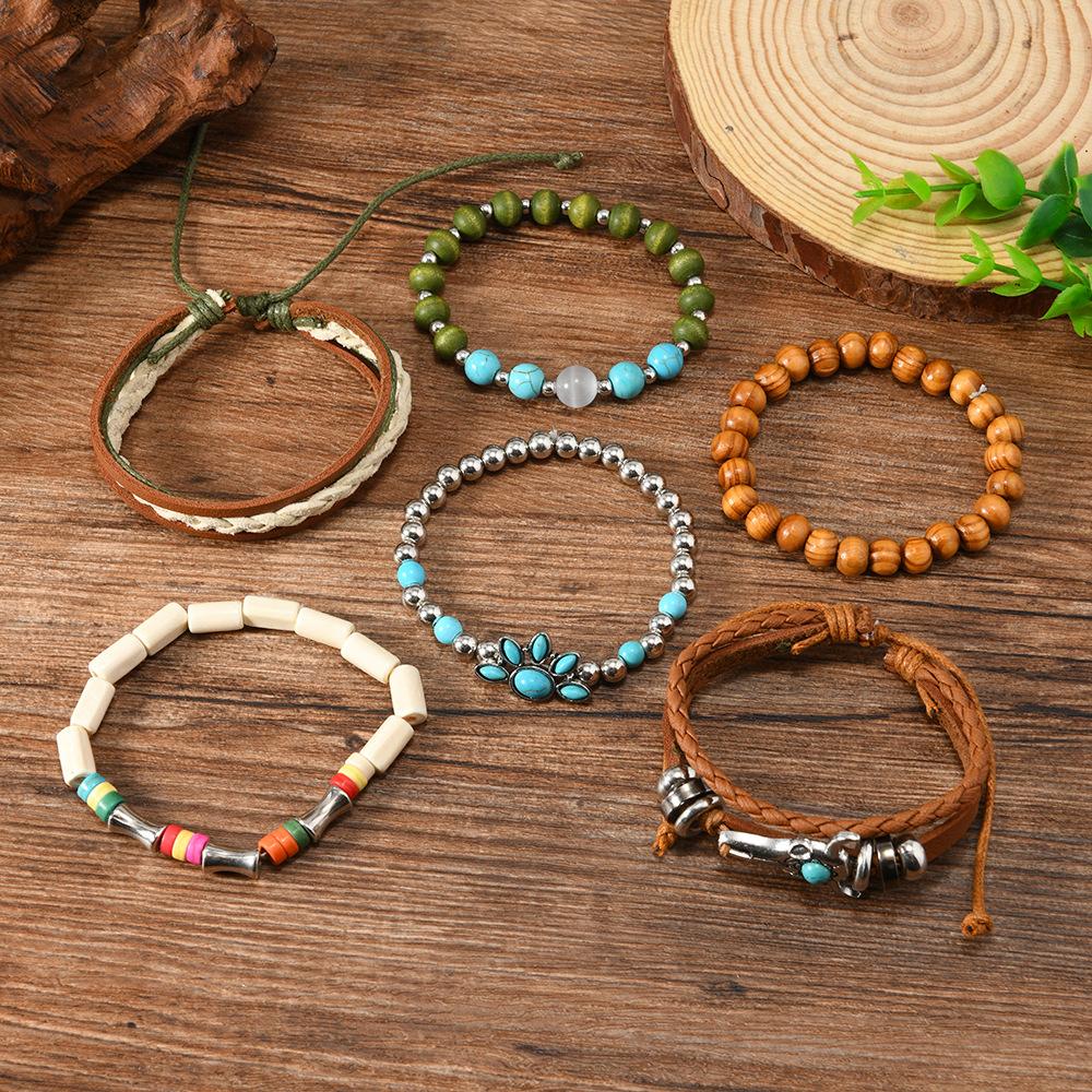 Cross-border new products European and American beaded alloy multi-layer retro bull head cat claw handwoven set bracelet