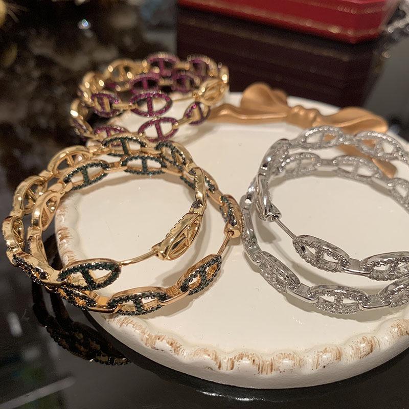 Ovale Schweinenasen-Ohrringe mit Super-Flash-Mikro-Pavé für ein schlankeres rundes Gesicht - Internet-Promi-Stil