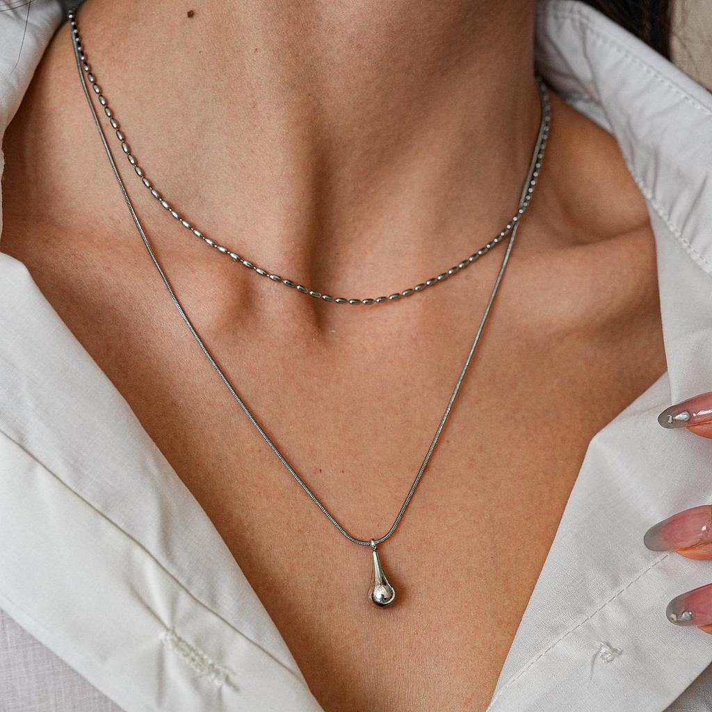 European & American Stainless Steel Double-Layer Water Drop Pendant Necklace - Fashionable Clavicle Chain for Women.