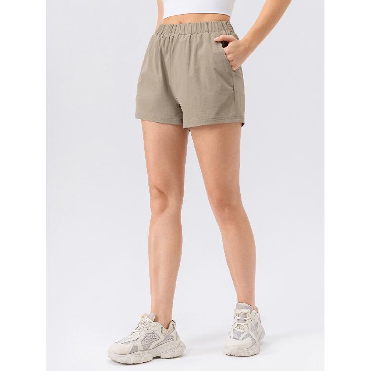 Nuovi Pantaloncini da Yoga Nudi Stampati da Donna con Tasche Delicati sulla Pelle Aderenti Elastici ad Asciugatura Rapida Pantaloncini Sportivi e per il Fitness