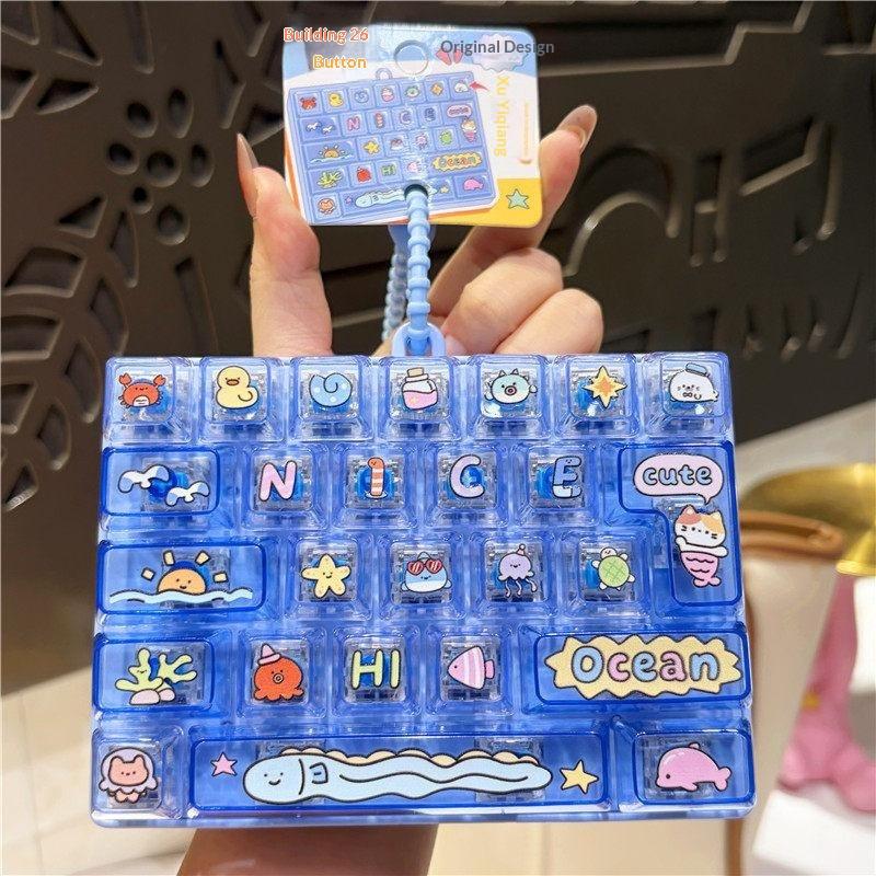 26-Tasten Fidget-Button Schlüsselanhänger BPA-freies sensorisches Dekompressionsspielzeug Wasserdichter Taschenanhänger für Outdoor-Ausflüge