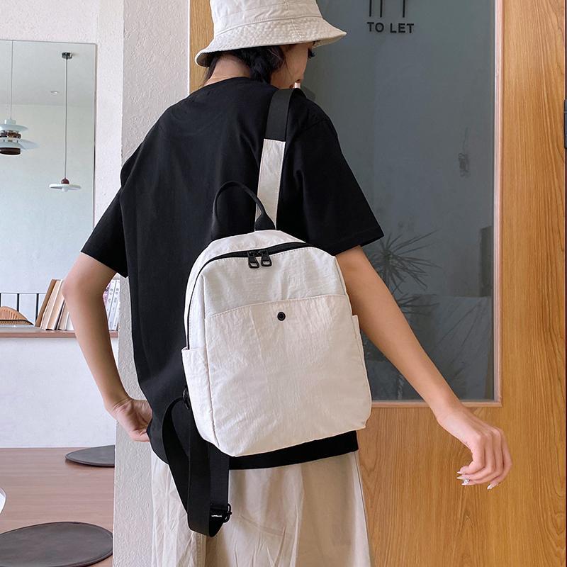 Schoolbag Solid Color Backpack Women's 1011 New Lightweight Large Capacity School Bag Versatile Nylon Travel Bag Commuter Small Backpack