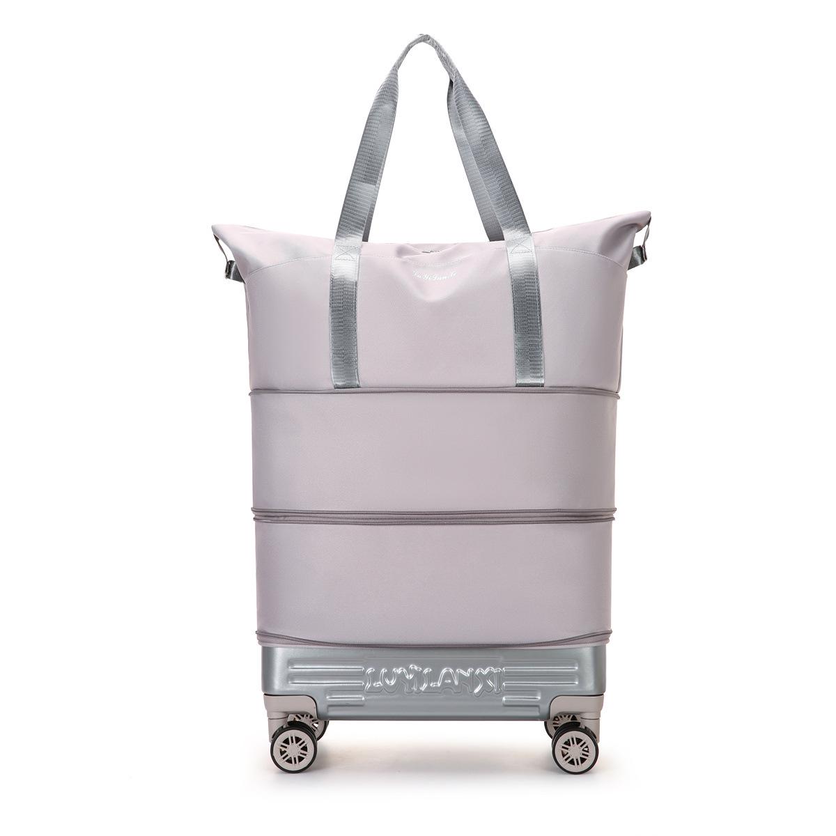 

New Foldable Travel Bag with Pull Rod & Wheels - Durable, High-Grade, Trendy, and Expandable Storage