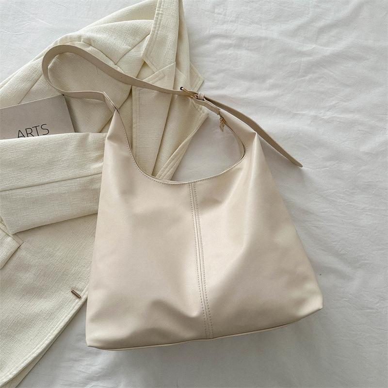 Simple texture solid color retro versatile ins shoulder bag women's 2025 new underarm bag tote bag tide