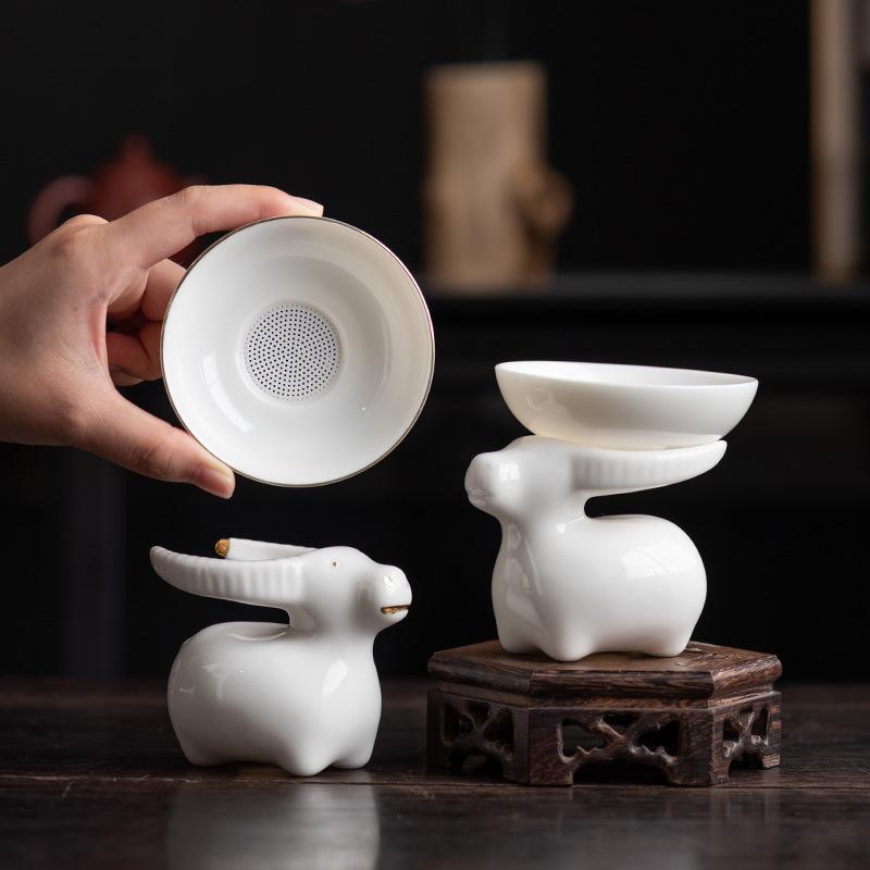 Talgjade Teeleck Weißporzellan Haushalts-Teeset Zubehör Teezeremonie Ochsengas Gold alle hundert Löcher Porzellan Teefilter
