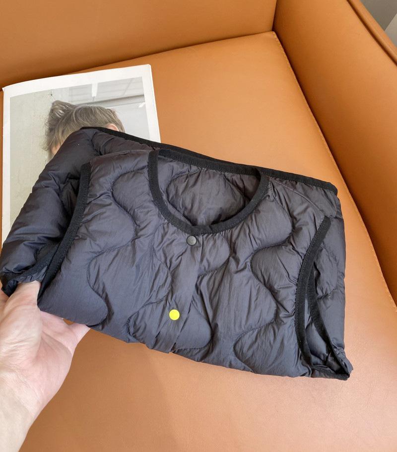 Ultra-Light Children's Down Vest, 90% Down, Round Neck, Snap Button Closure, Suitable as Outerwear or Inner Layer.