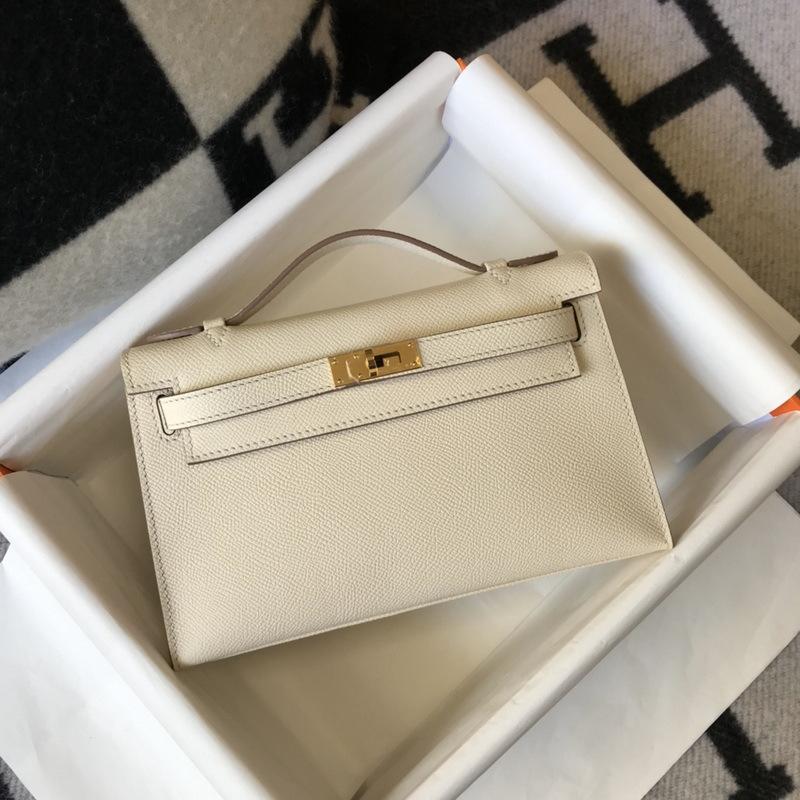Nuova borsa da donna in vera pelle, mini generazione, alla moda, portatile, con palmo in pelle bovina di primo strato, 22 cm