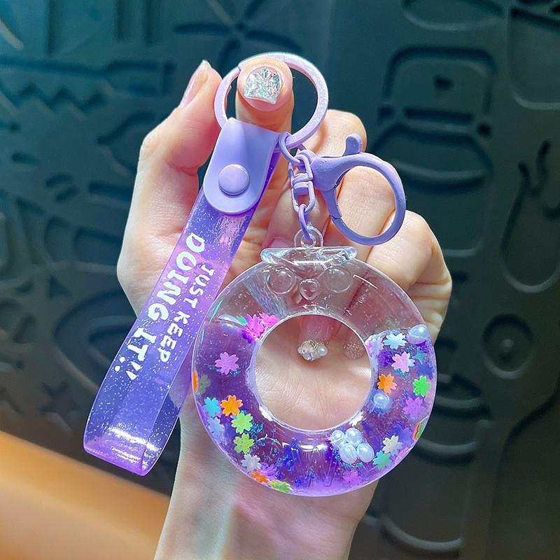 Exquisite Quicksand Panda Keychain: Cartoon Oil-Filled Doll Bag Pendant and Car Accessory