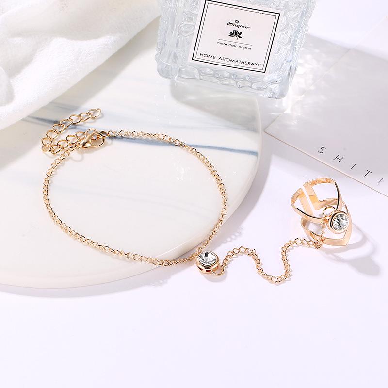 Fashionable European & American Knuckle Ring with Diamond-Studded Leaf Design and Attached Bracelet for Women