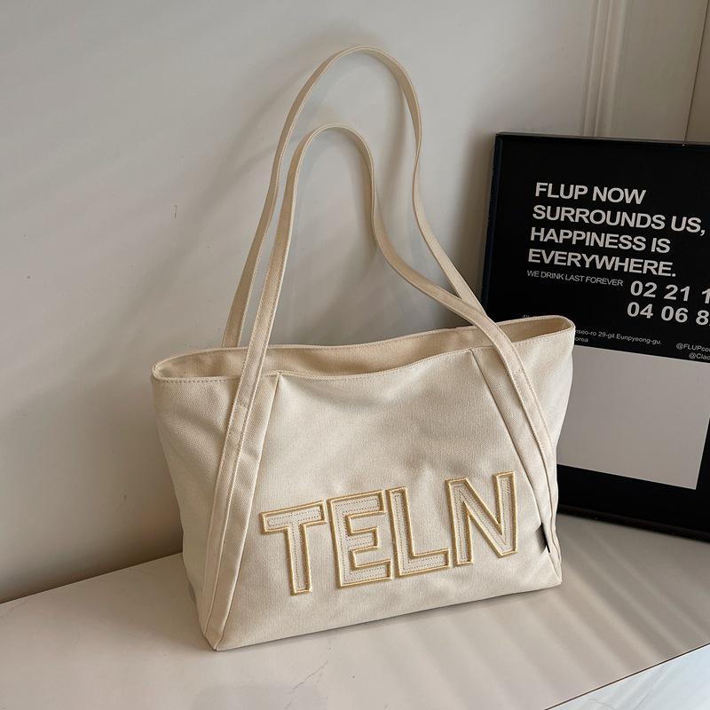 

2024 Женская осенняя холщовая сумка-тоут большой вместимости - Повседневная, простая и модная грязно-белый