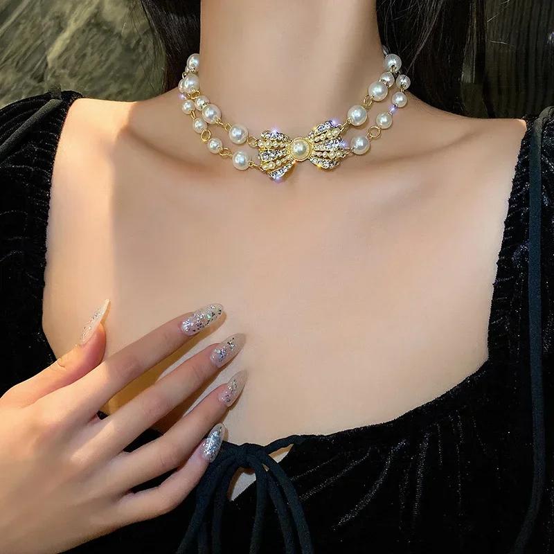 Fasjonabel dobbeltlags perleinnlagt diamant sløyfe kragebeinskjede INS retro high-end følelse utsøkt og elegant halskjede