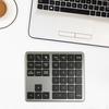 Mini numerická klávesnice 2,4G bezdrátová Bluetooth kompatibilní s duálními režimy 35 kláves Tichý přenosný notebook Klávesnice pro telefon Počítačové příslušenství