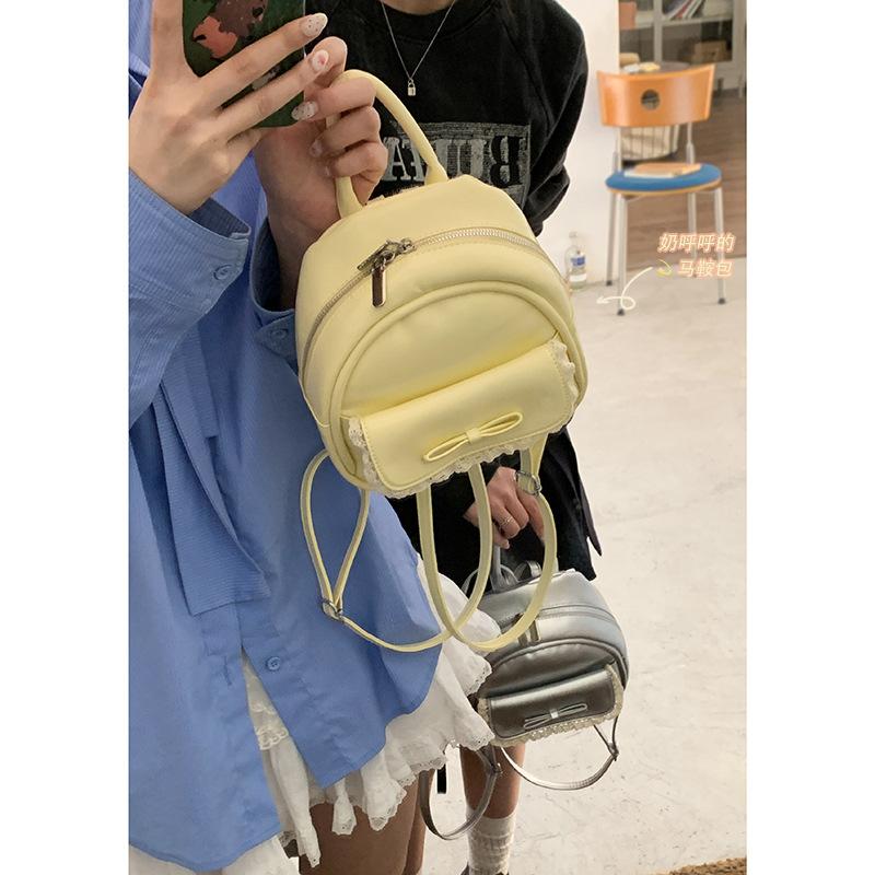 Korean version of cute bow backpack women's 2025 new summer fashion small backpack versatile portable travel bag