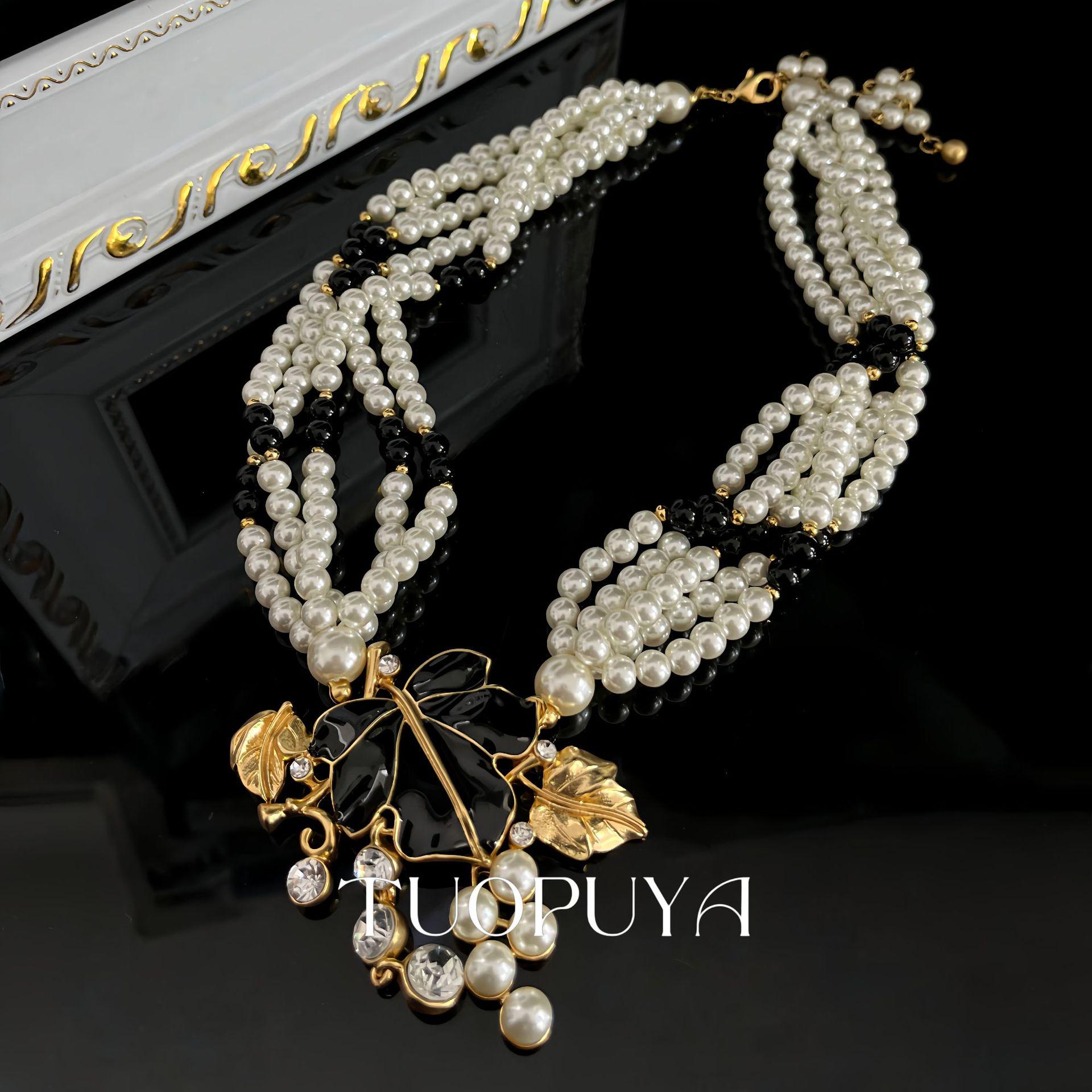 Retro Multi-Layer Pearl Necklace with Maple Leaf Diamond Pendant