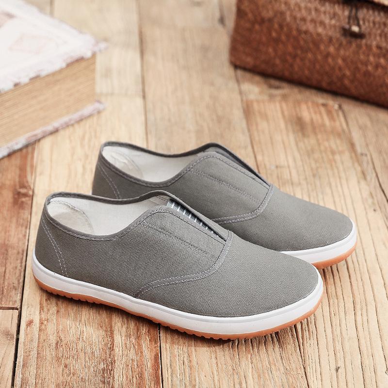 Frühling und Sommer neue Deckschuhe Herren Freizeitschuhe Arbeitsschutzschuhe Canvas-Schuhe Rindflechsensohle Low-Top rutschfest weiche Sohle Einslipper