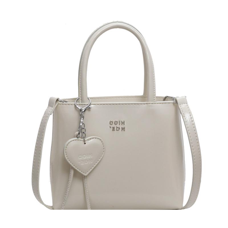 

Модная трендовая сумка через плечо в корейском стиле - Нишевый дизайн, кроссбоди и повседневная городская женская сумка бежевый