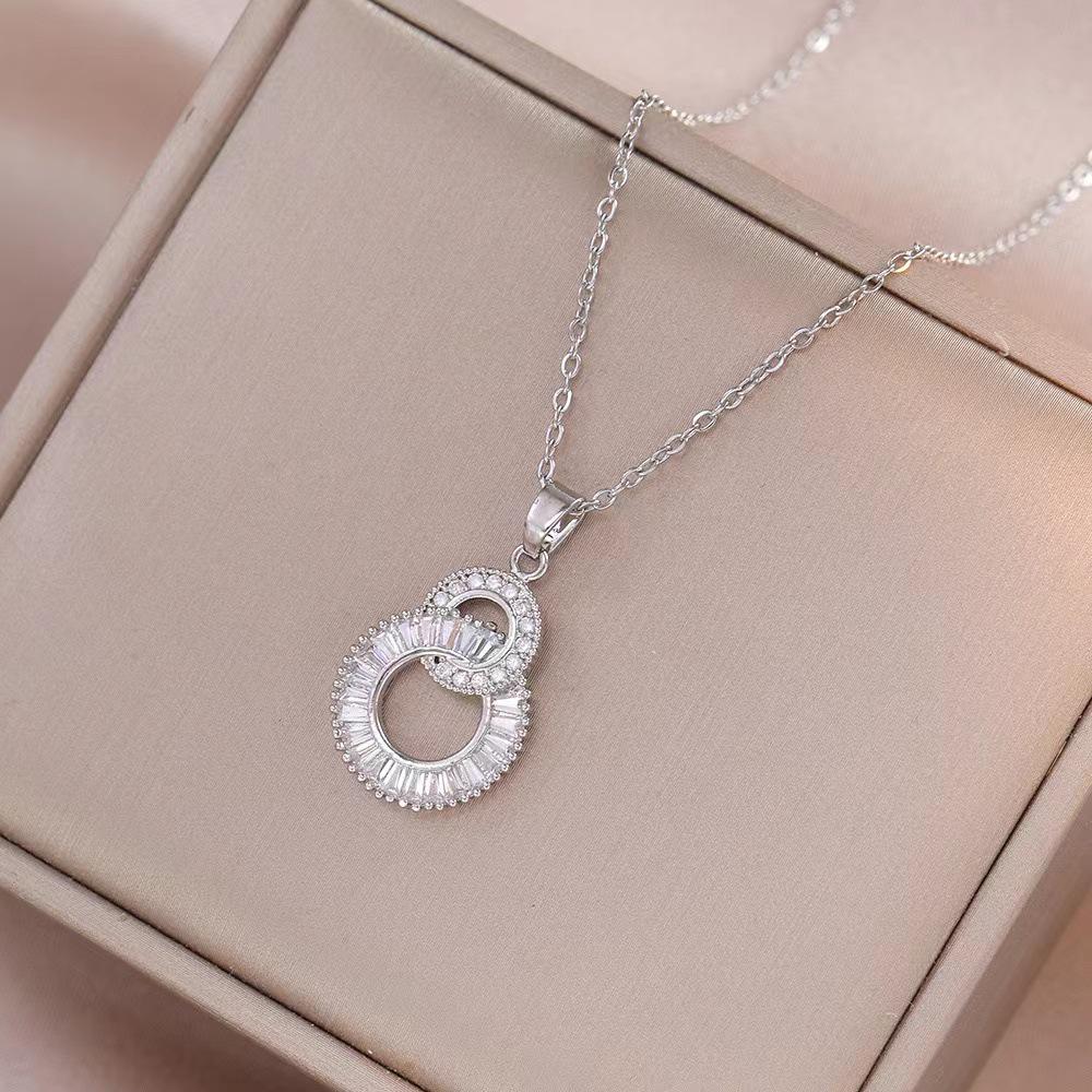 

Женский комплект из колье и серег с цирконами в форме восьмерки: Модный аксессуар в японско-корейском стиле