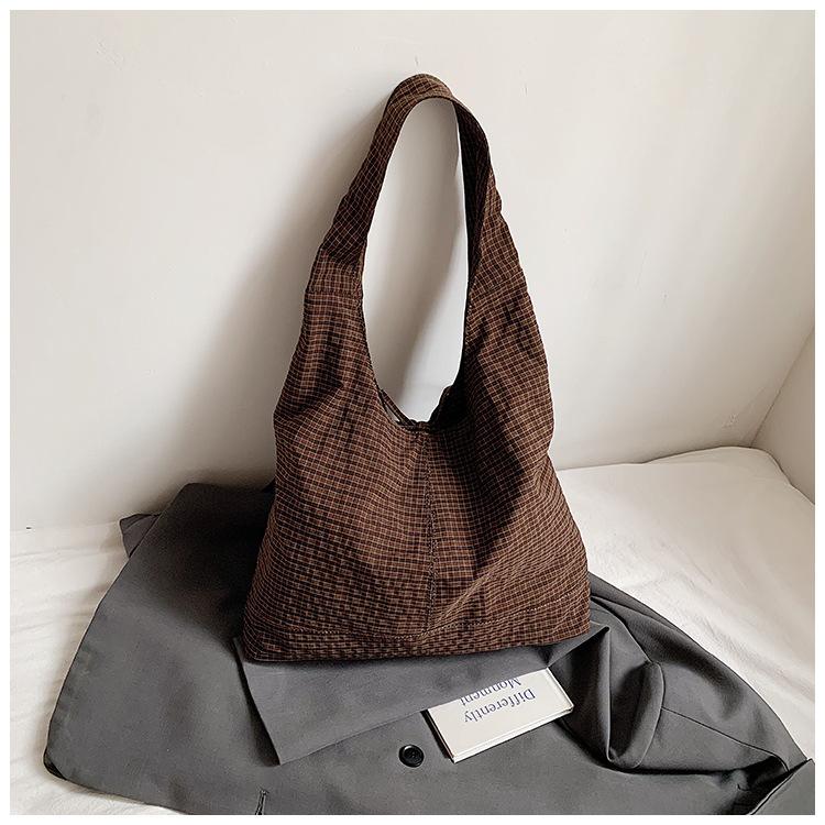 Plaid canvas bag women's large capacity 2025 new versatile casual shoulder armpit bag class commuter tote big bag