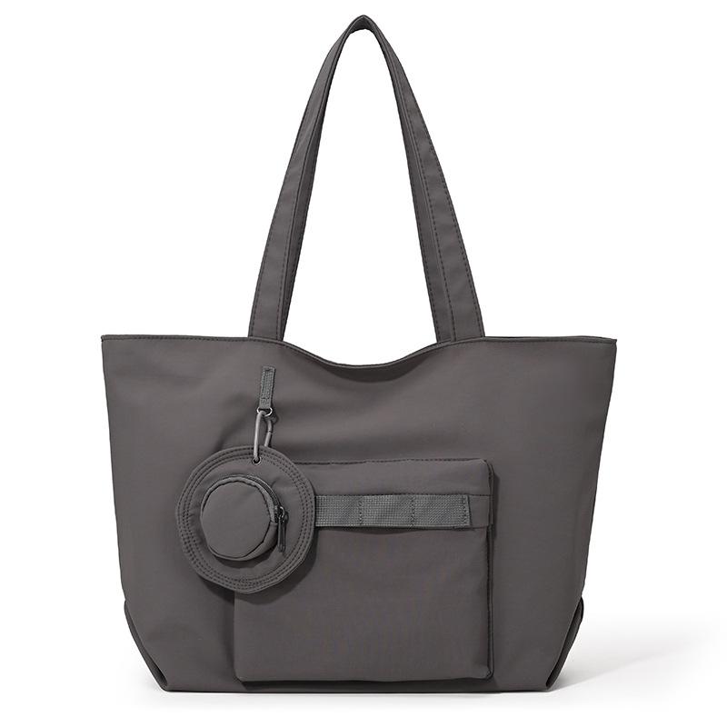 

Korean and Japanese style large-capacity tote bag for women, shoulder handbag for commuting, casual simple canvas bag for studen сірий колір
