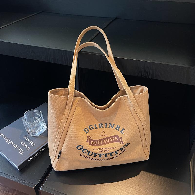 

2025 new autumn shopping bag large capacity canvas bag casual portable shoulder women s bag simple tote bag women s хакі