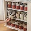 10PCS Shoe Rack with Vertical Design and Gold Ring. Made of Durable Polypropylene, It Supports High Heels and Sneakers for Stability