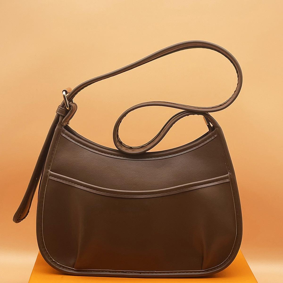 

Сумка Новая Женская Сумка Одноплечевая Сумка Кроссбоди Сумка-ведро Сумка-седло Нишевая Универсальная Стиль Инс Одноплечевая Сумка темно-коричневого