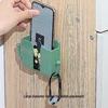 Adhesive Wall-Mount Phone Charging and Remote Holder