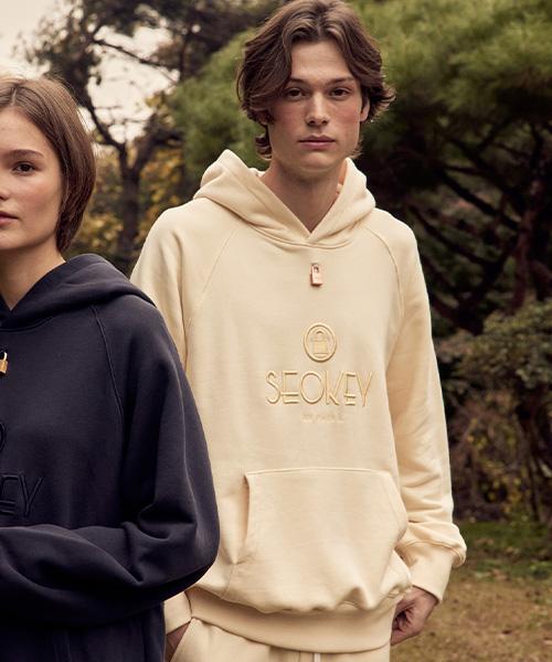 Seoki Padlock Signature Raglan Sleeve Hoodie (Cream) (Unisex) Black/1