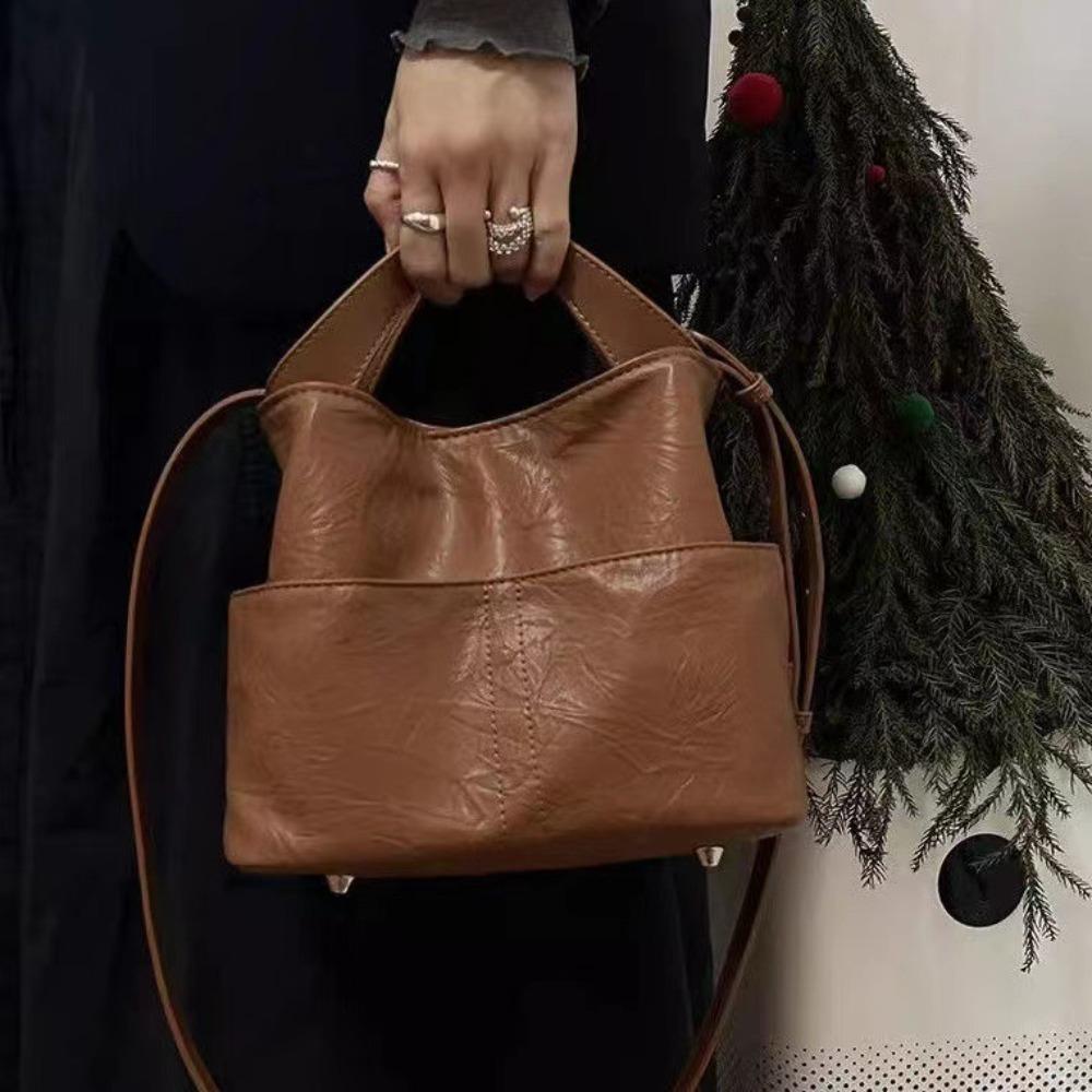 

Bag Women s 2026 Early Spring New Large Capacity Handbag Premium Sense Niche Commuter Hand Grab Crossbody Bucket Bag коричневый