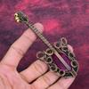 Faceted Kashmir Ruby Gemstone Pendant Copper Wire Wrapped Guitar Design Pendant