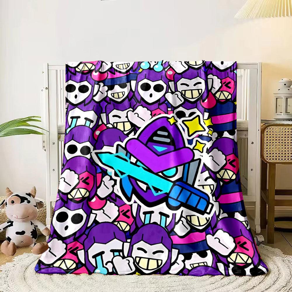 A colorful pattern of cartoonish skeletons and a central purple character. for all seasons blanket lunch break throw gift 80cm x 120cm