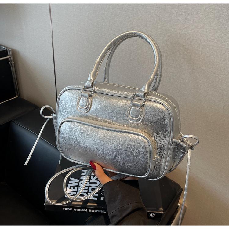 Niche design bag new fashion casual backpack women's hand retro shoulder pillow bag