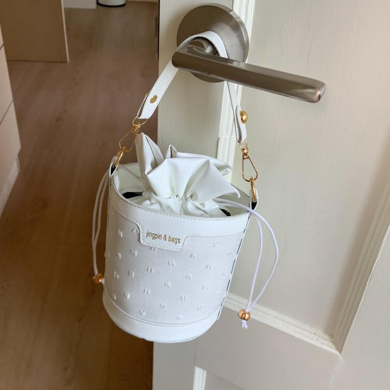 

Летний новый тренд сумка-ведро цилиндрической формы нишевое хранение портативная на плечо мессенджер белый