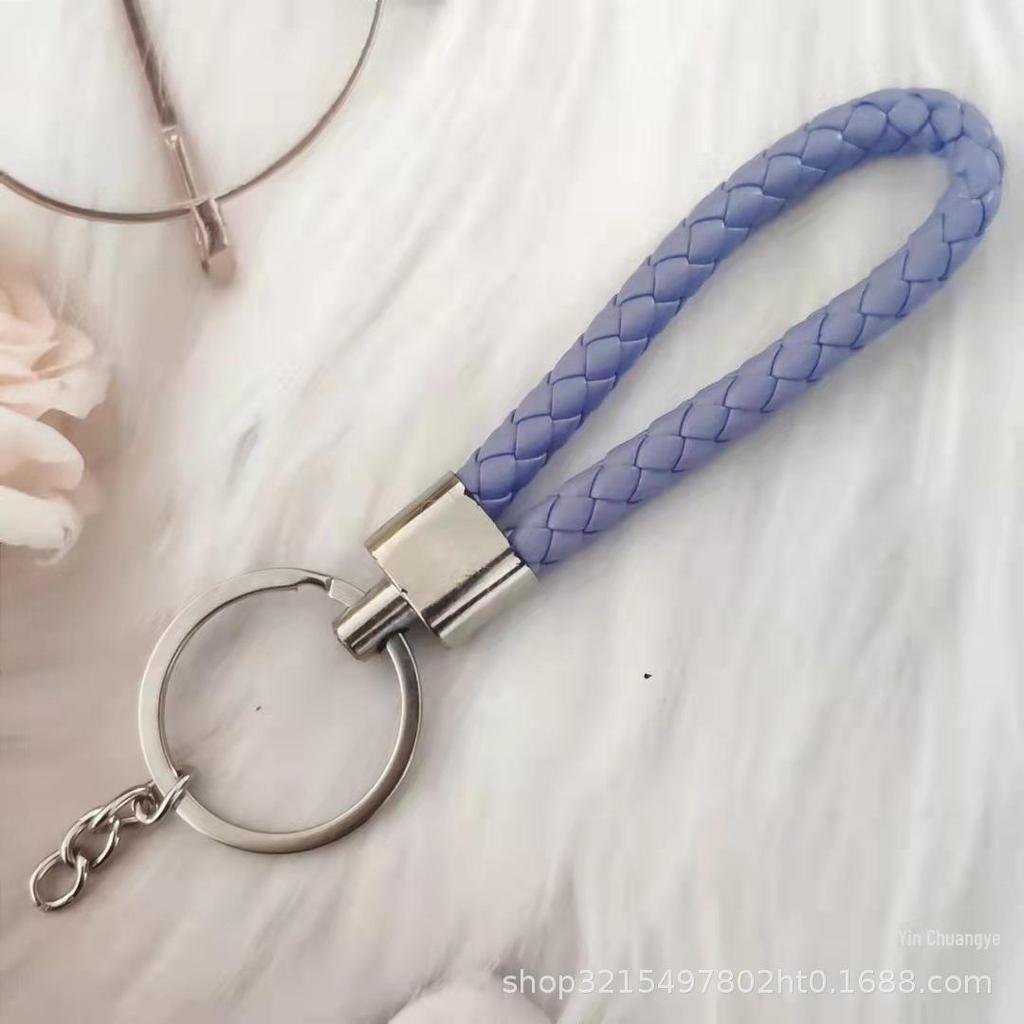 Gevlochten Lederen Touw Sleutelhanger met Poppenhanger - Modieus en Creatief Accessoire